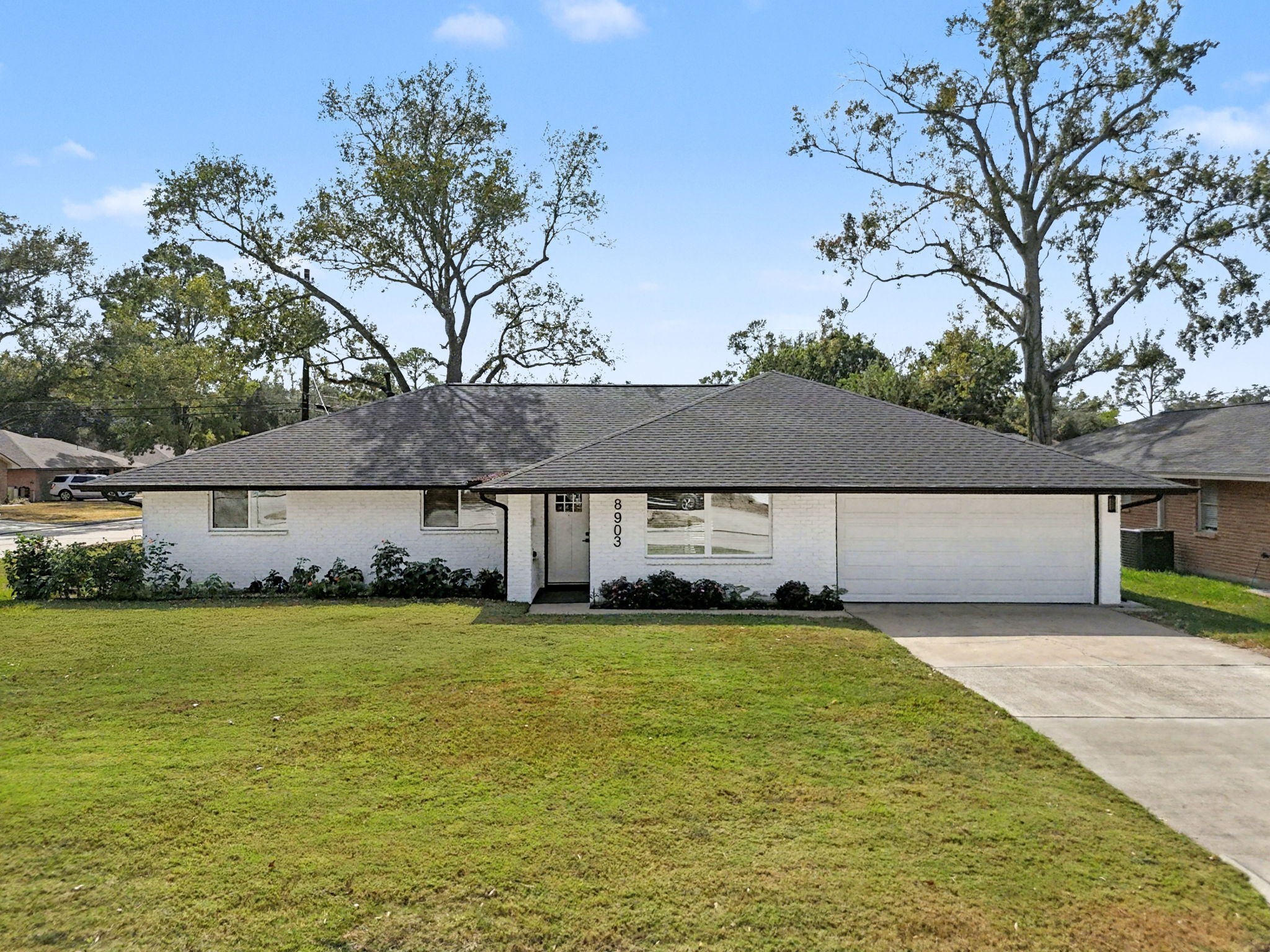 8903 Railton Street Houston, TX 77080 - Photo 1 of 30 Corner lot and painted brick for great curb appeal.