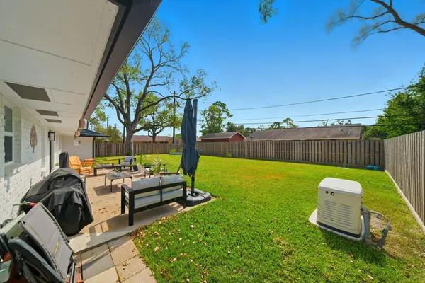 a view of garden with patio