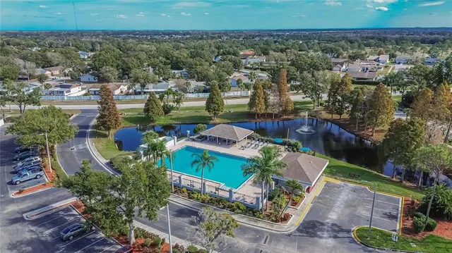 a view of a lake with a yard