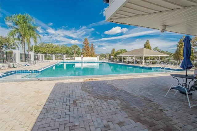 a view of a lake with houses in outdoor space