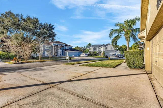 a view of houses with yard