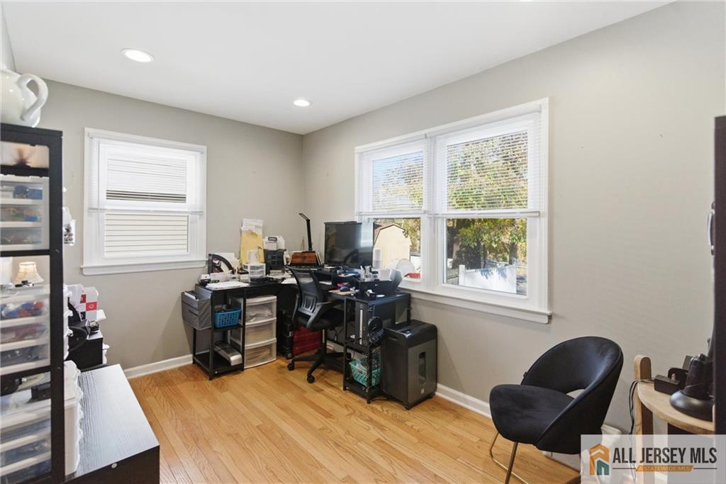 286 William Street Piscataway, NJ 08854 - Photo 14 of 23 a view of a workspace with furniture and a window