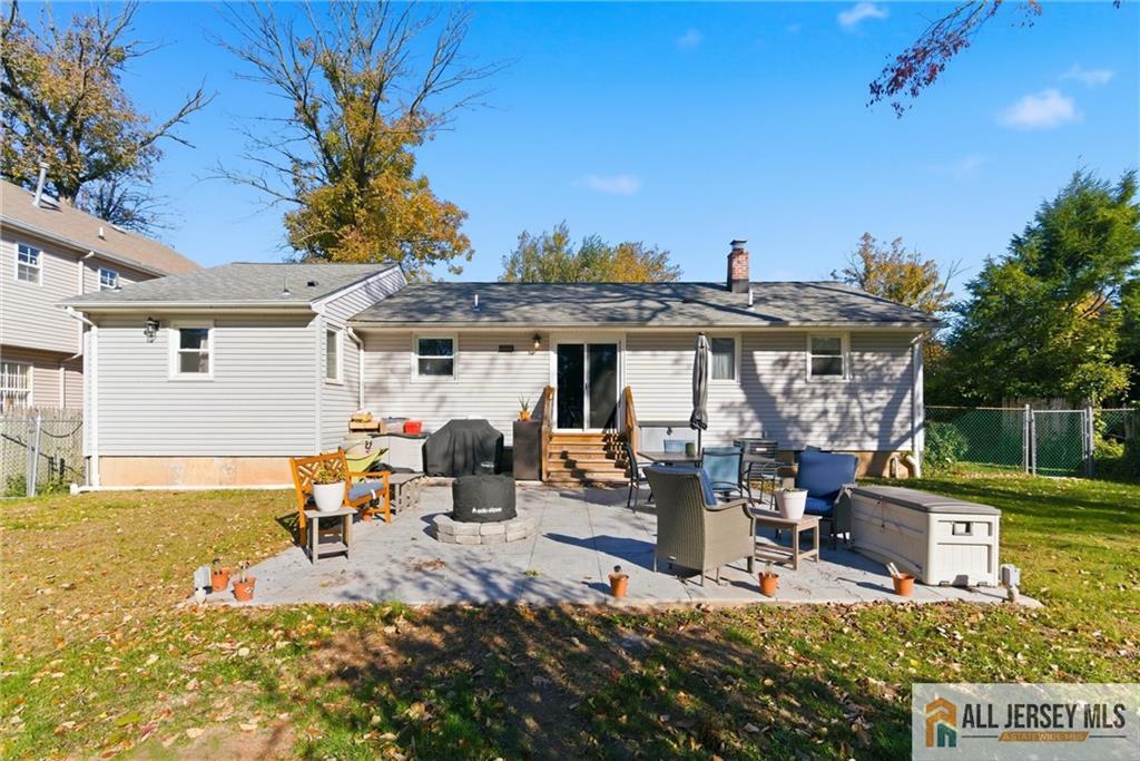 286 William Street Piscataway, NJ 08854 - Photo 20 of 23 a view of a house with backyard sitting area and garden