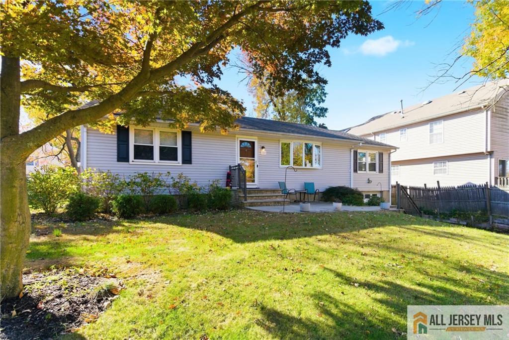286 William Street Piscataway, NJ 08854 - Photo 2 of 23 a front view of house with yard and green space