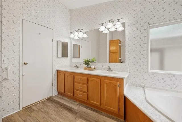 a view of a room with rack and wooden floor