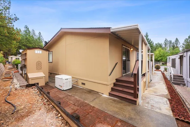 a view of a back yard of the house