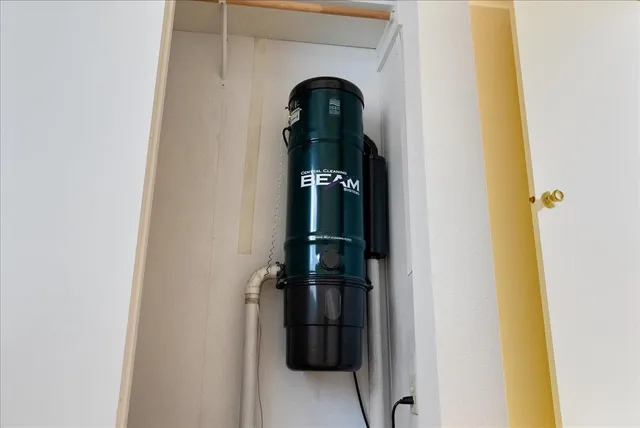 a green field with lots of tress in it