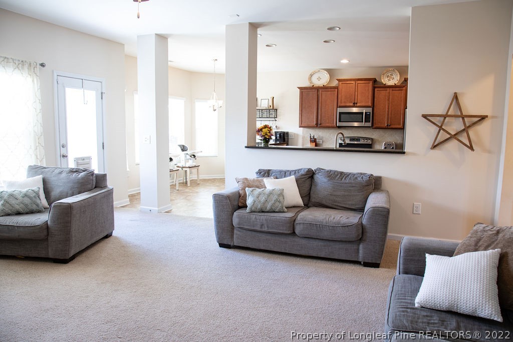 115 Stonehurst Drive Spring Lake, NC 28390 - Photo 14 of 50 a living room with furniture and a couch