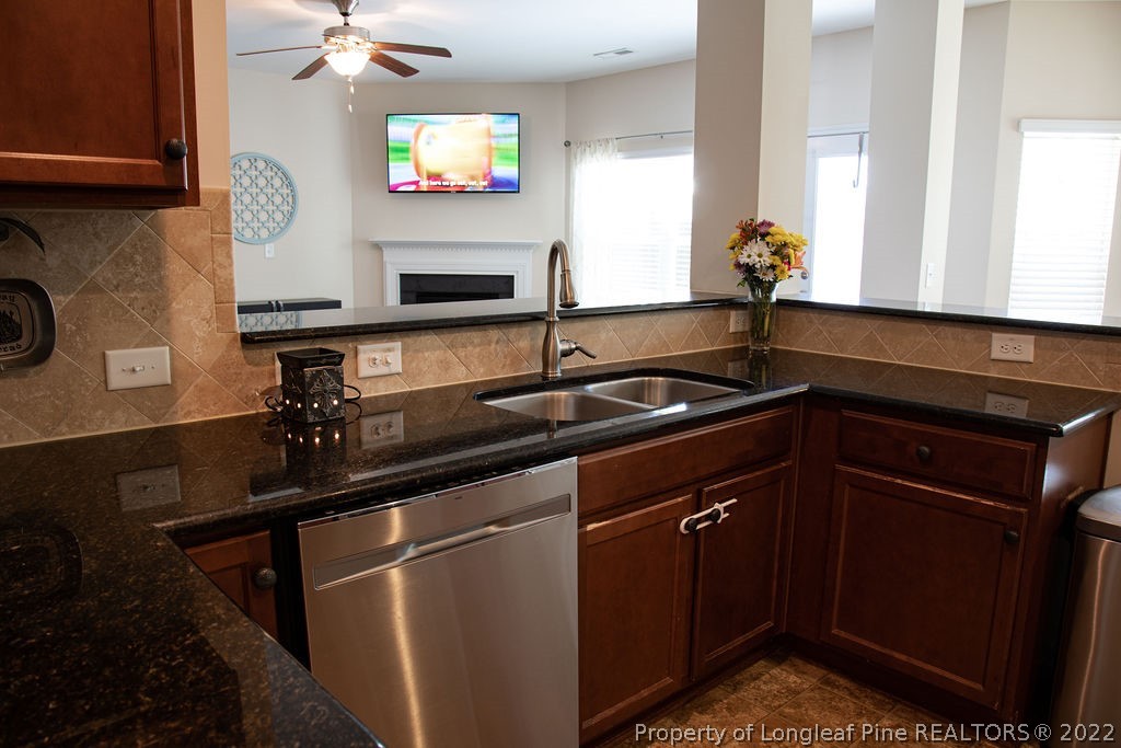 115 Stonehurst Drive Spring Lake, NC 28390 - Photo 20 of 50 a kitchen with a sink and cabinets