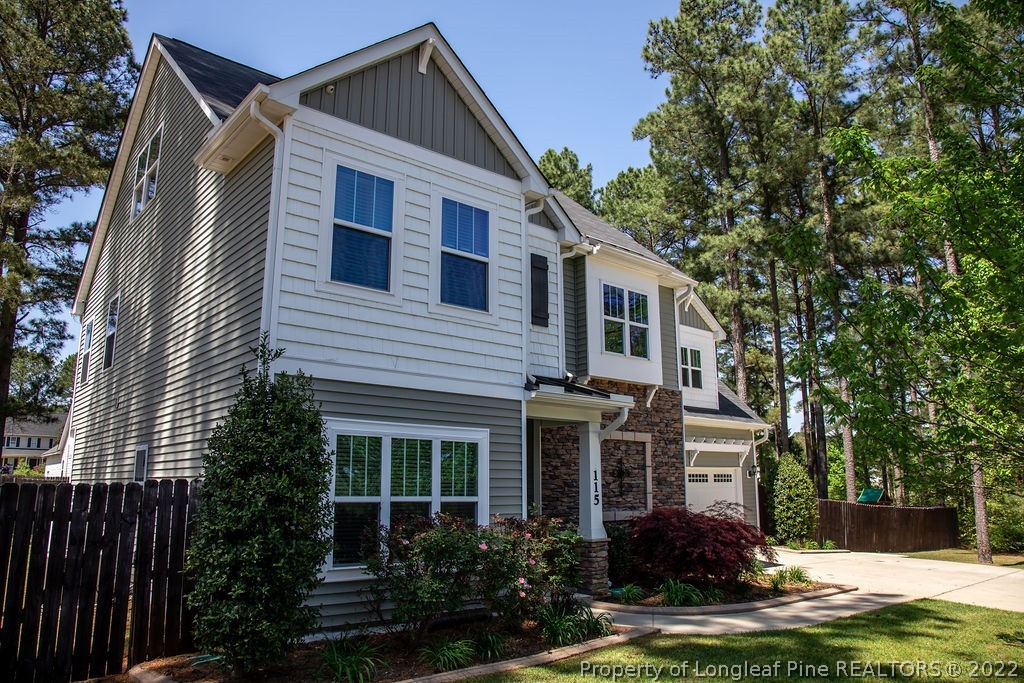115 Stonehurst Drive Spring Lake, NC 28390 - Photo 2 of 50 a front view of a house with a yard