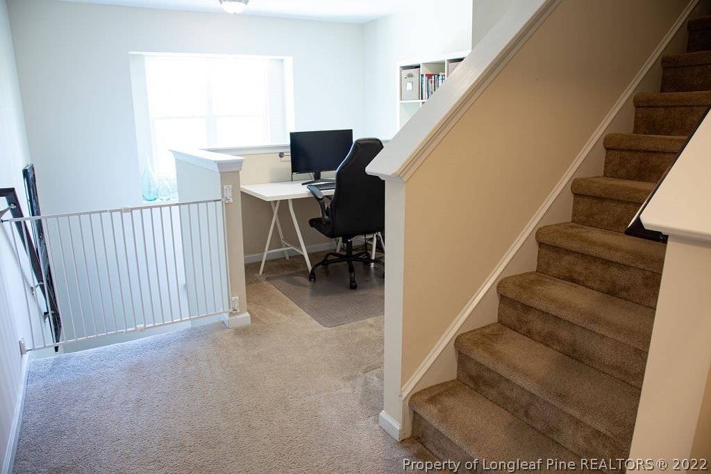 115 Stonehurst Drive Spring Lake, NC 28390 - Photo 22 of 50 a view of entryway and hall with wooden floor