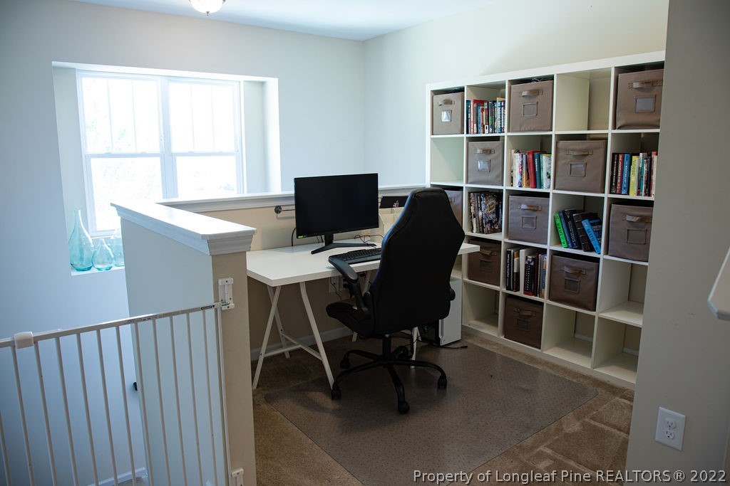 115 Stonehurst Drive Spring Lake, NC 28390 - Photo 23 of 50 a view of a workspace with furniture and a window