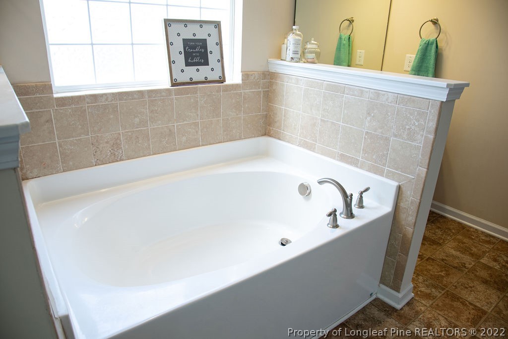 115 Stonehurst Drive Spring Lake, NC 28390 - Photo 33 of 50 a bathroom with a bathtub