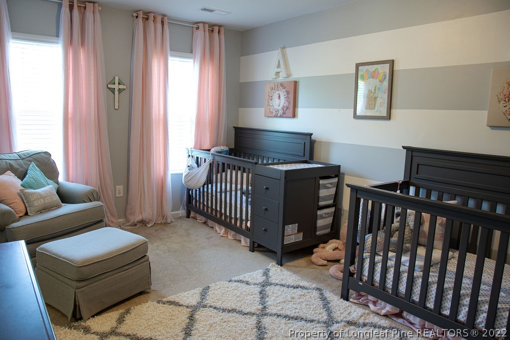 115 Stonehurst Drive Spring Lake, NC 28390 - Photo 37 of 50 a bedroom with furniture and a window