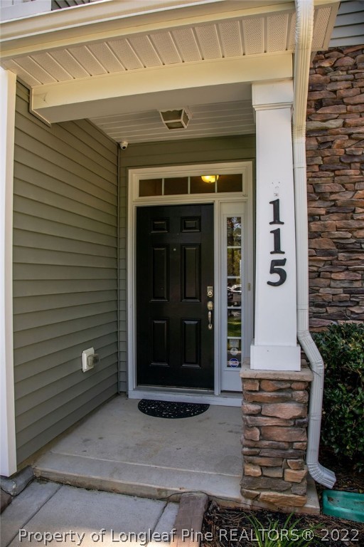 115 Stonehurst Drive Spring Lake, NC 28390 - Photo 5 of 50 a front view of a house with a garage