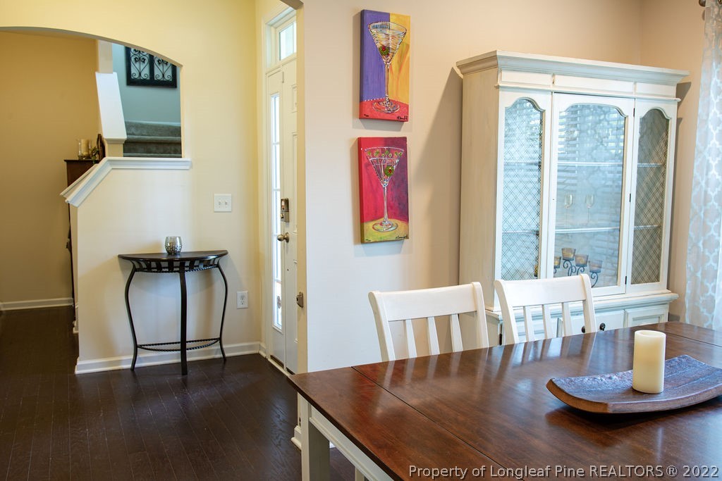 115 Stonehurst Drive Spring Lake, NC 28390 - Photo 7 of 50 a dining room with furniture and wooden floor