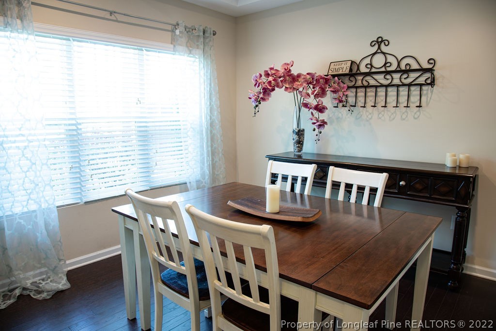 115 Stonehurst Drive Spring Lake, NC 28390 - Photo 8 of 50 a view of a dining room with furniture and window