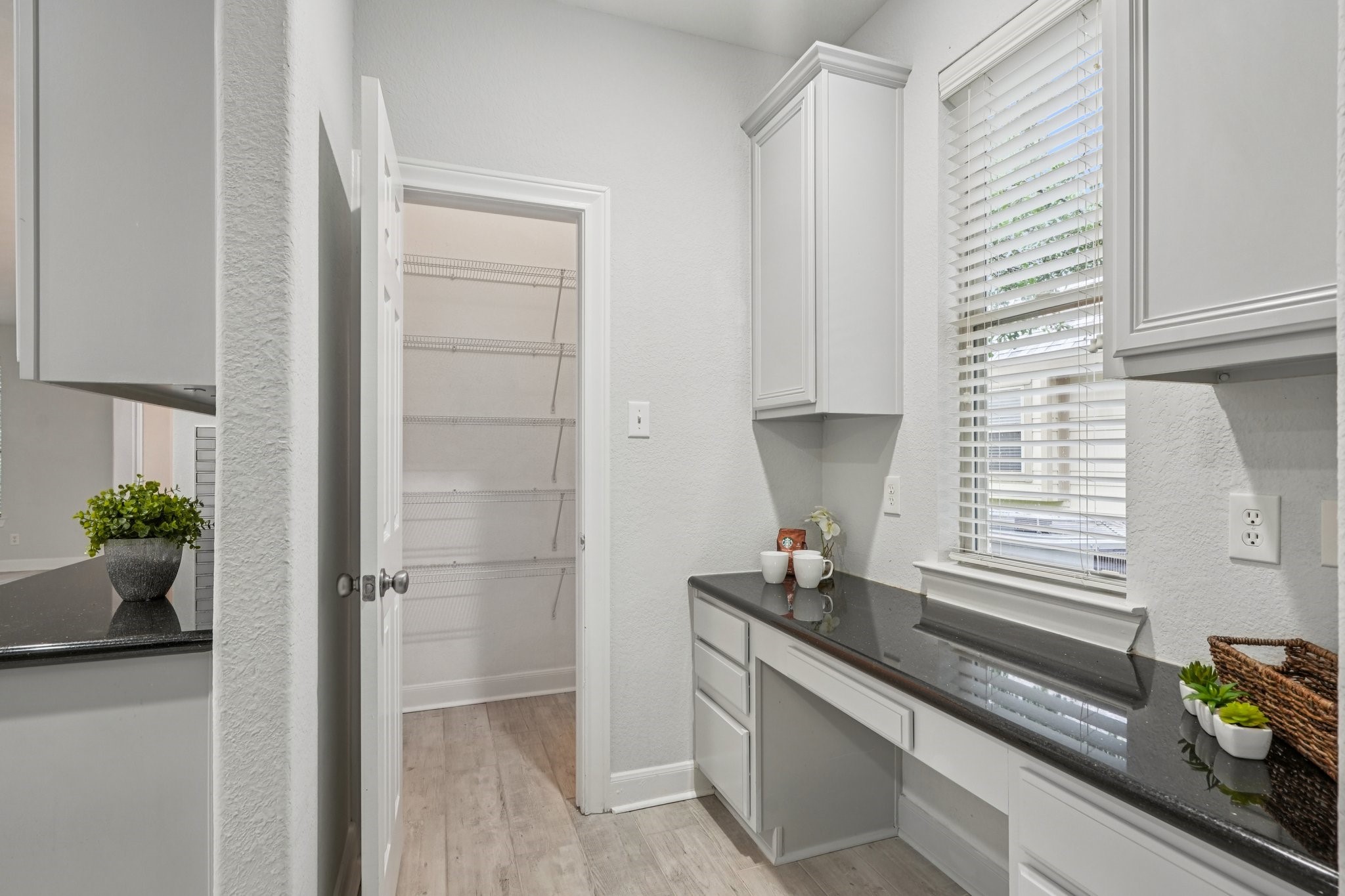 90 Panterra Way Spring, TX 77382 - Photo 19 of 43 a kitchen with a refrigerator and a sink
