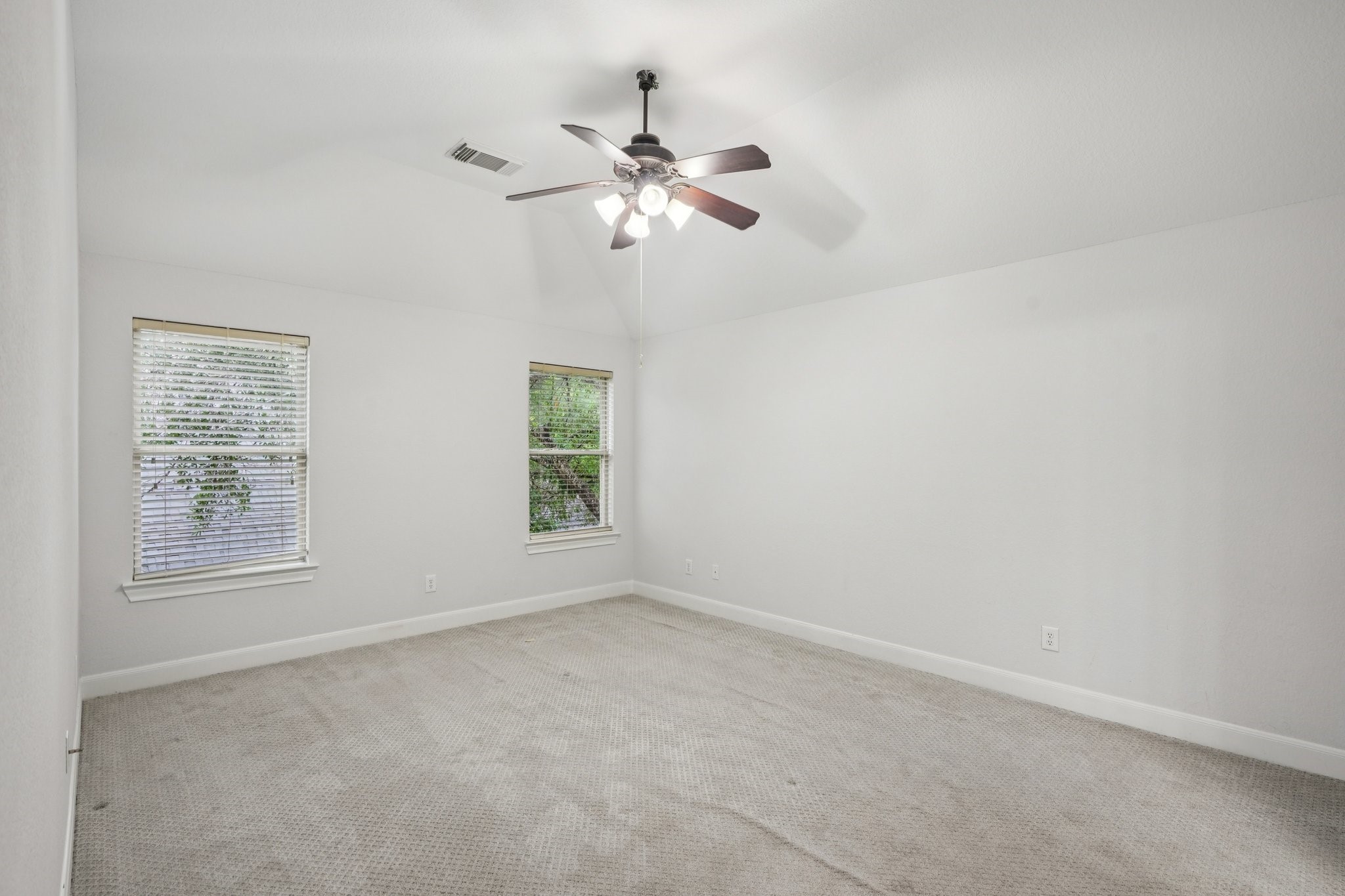 90 Panterra Way Spring, TX 77382 - Photo 24 of 43 an empty room with windows and fan