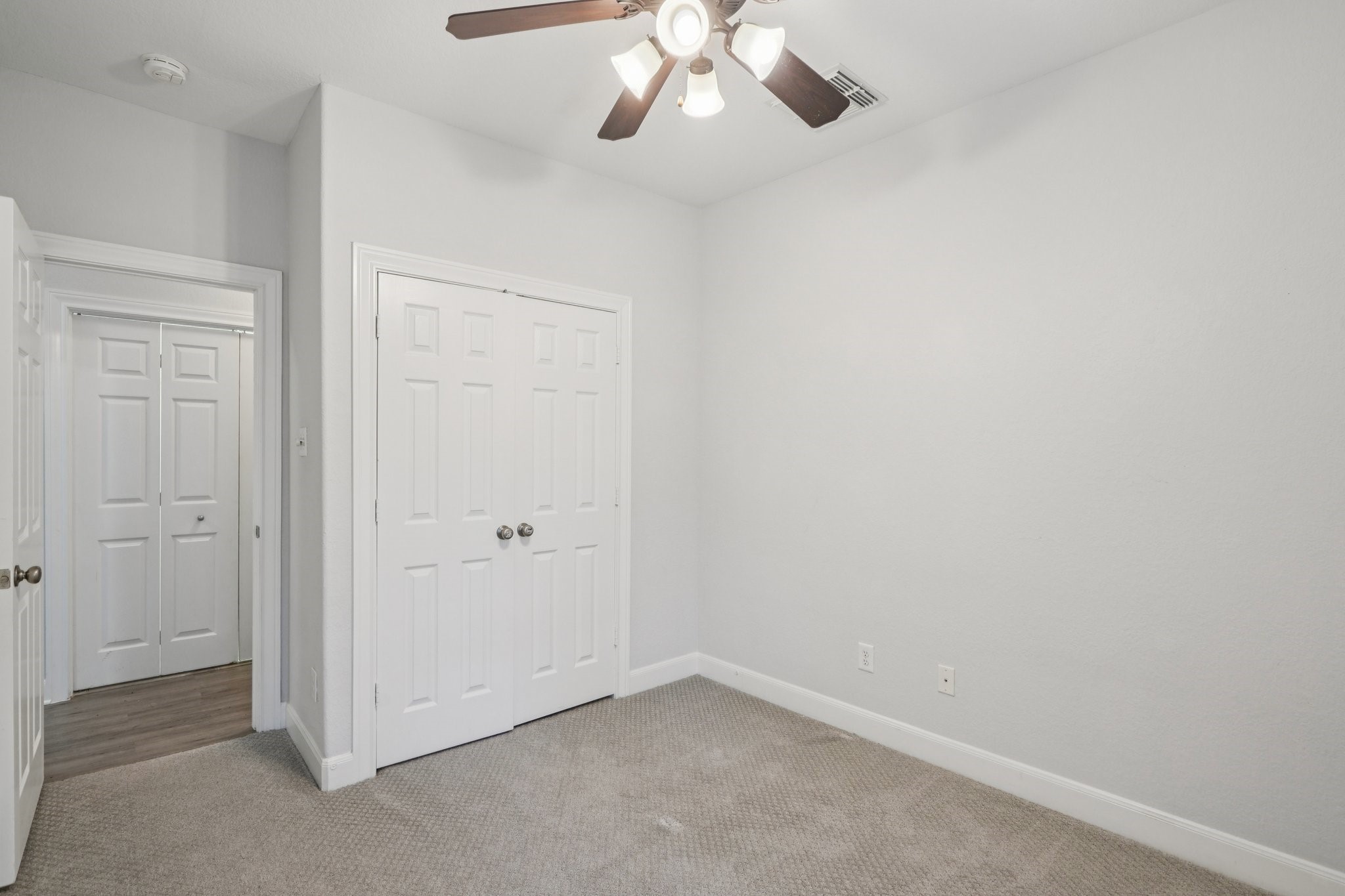 90 Panterra Way Spring, TX 77382 - Photo 32 of 43 an empty room with a chandelier fan