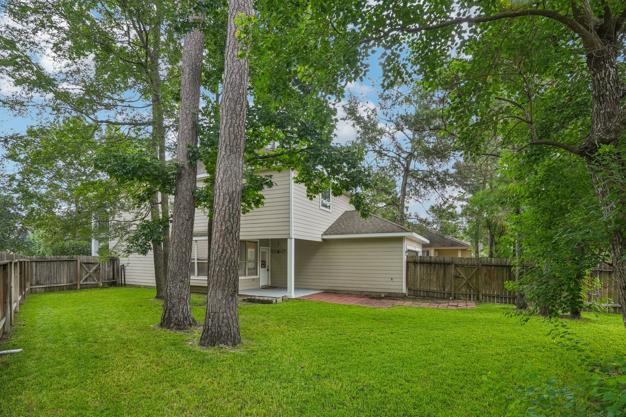 90 Panterra Way Spring, TX 77382 - Photo 41 of 43 a front view of a house with a yard and tree