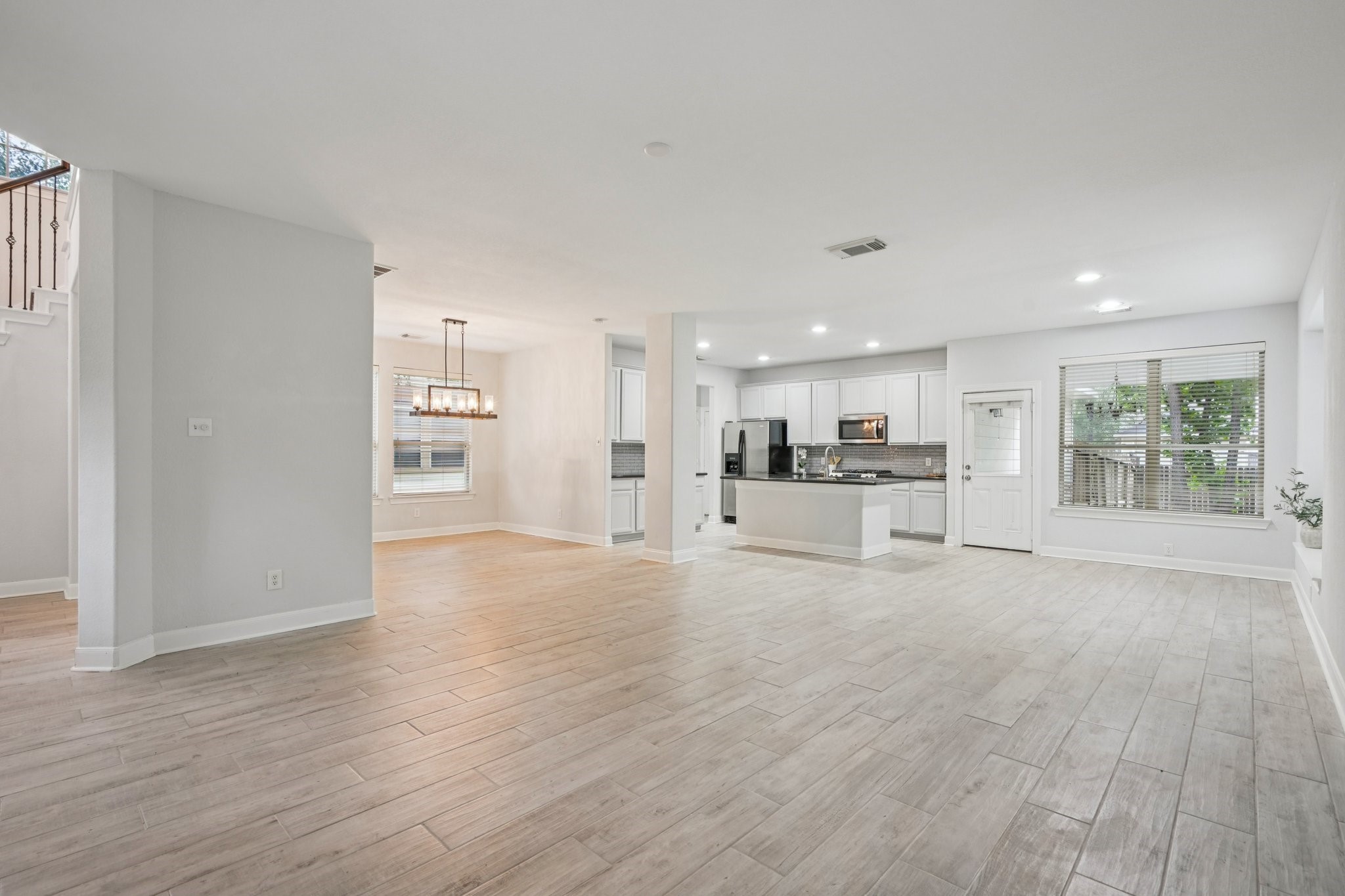 90 Panterra Way Spring, TX 77382 - Photo 8 of 43 a view of kitchen with refrigerator and window
