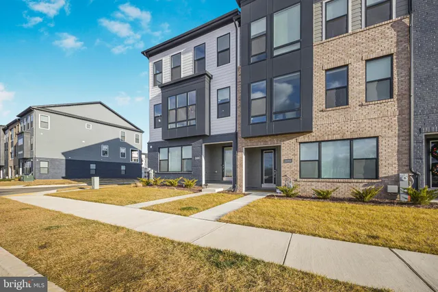 a view of large building with a swimming pool