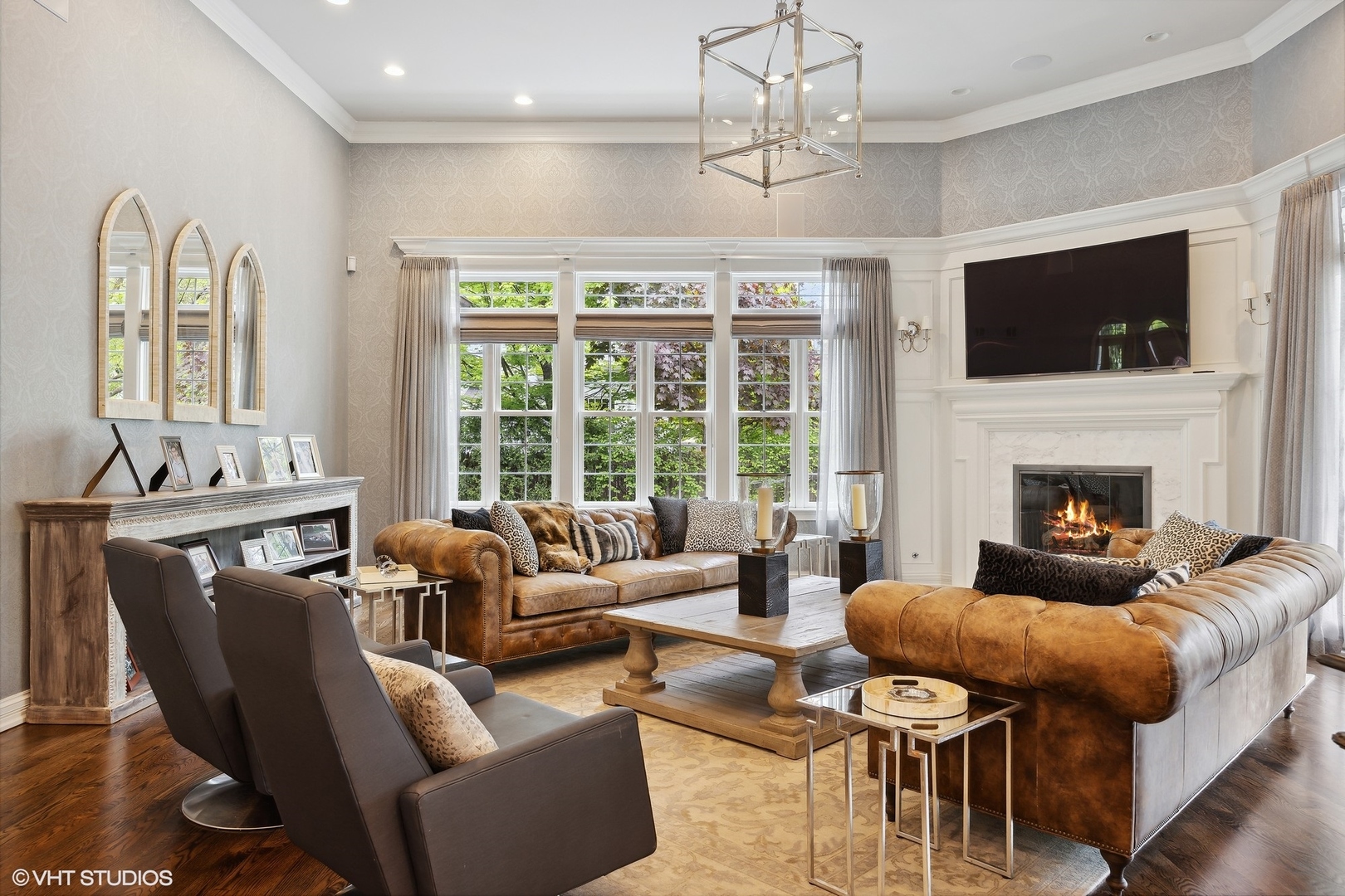339 Linden Street Winnetka, IL 60093 - Photo 13 of 69 a living room with furniture a flat screen tv and a fireplace