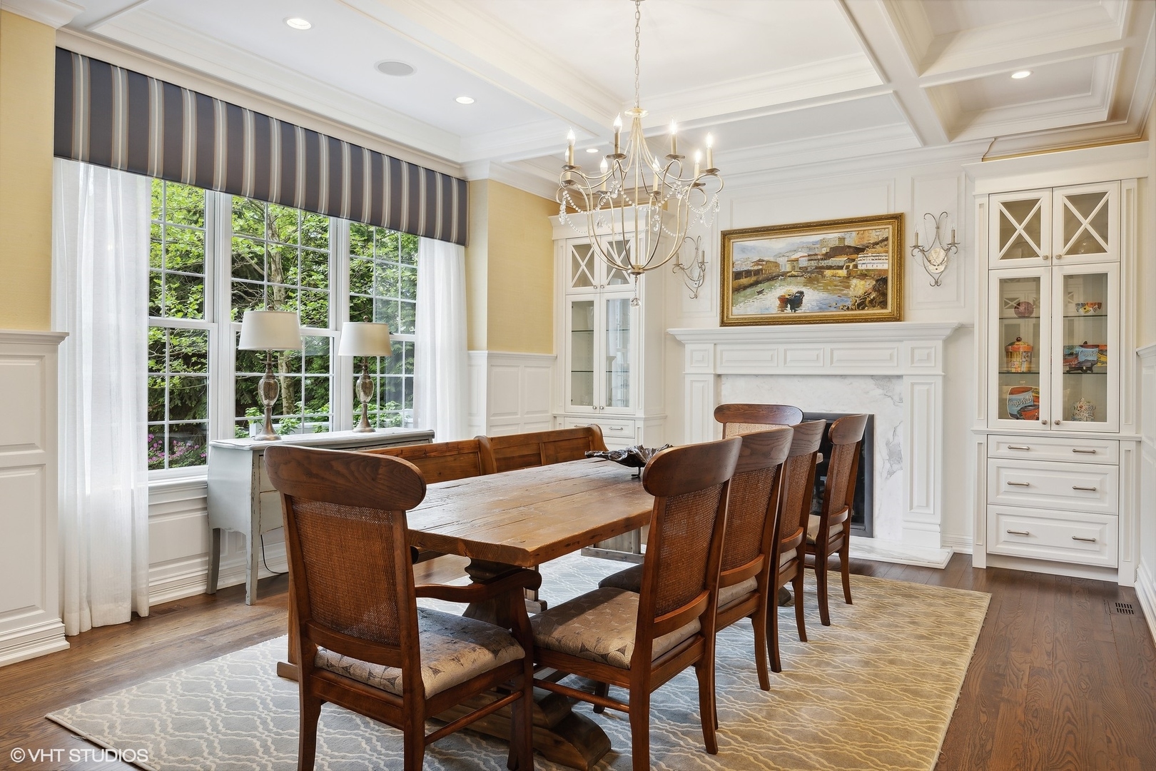 339 Linden Street Winnetka, IL 60093 - Photo 18 of 69 a view of a dining room with furniture a chandelier and wooden floor