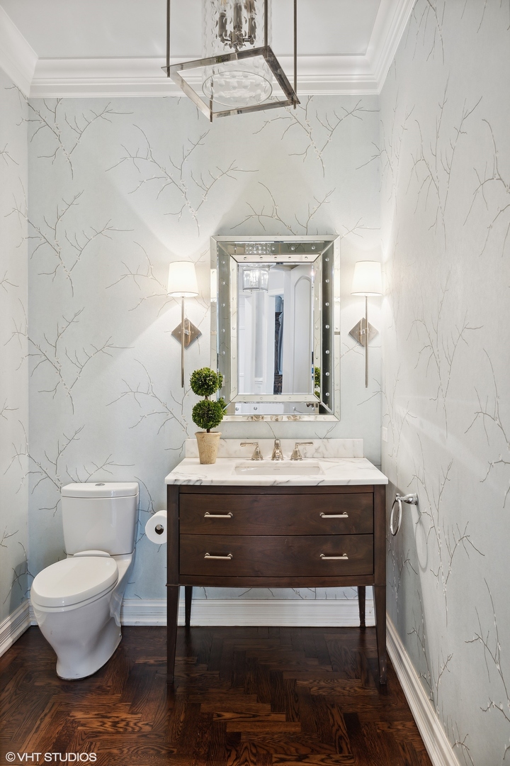 339 Linden Street Winnetka, IL 60093 - Photo 22 of 69 a view of bathroom sink and a toilet