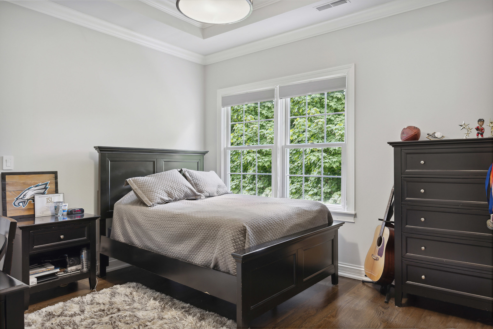 339 Linden Street Winnetka, IL 60093 - Photo 40 of 69 a bedroom with a bed and a dresser