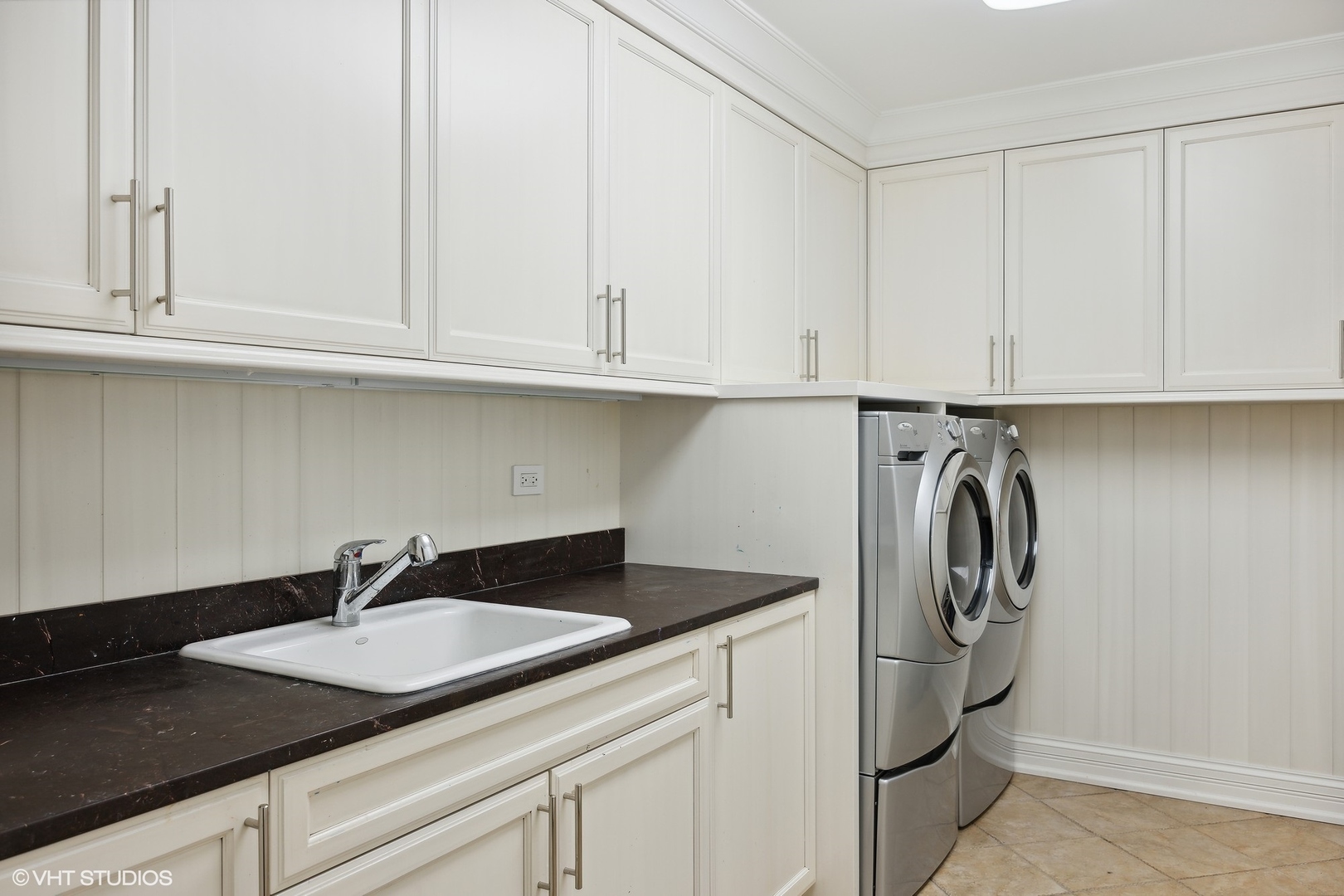 339 Linden Street Winnetka, IL 60093 - Photo 53 of 69 a kitchen with stainless steel appliances granite countertop a sink a refrigerator and a white stove