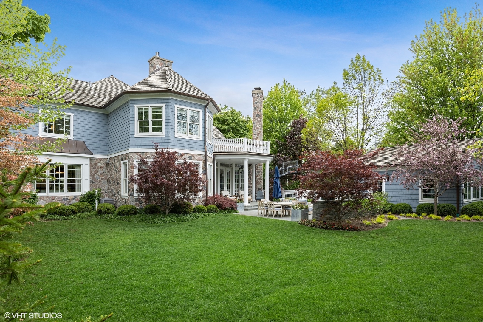 339 Linden Street Winnetka, IL 60093 - Photo 62 of 69 a front view of a house with a garden