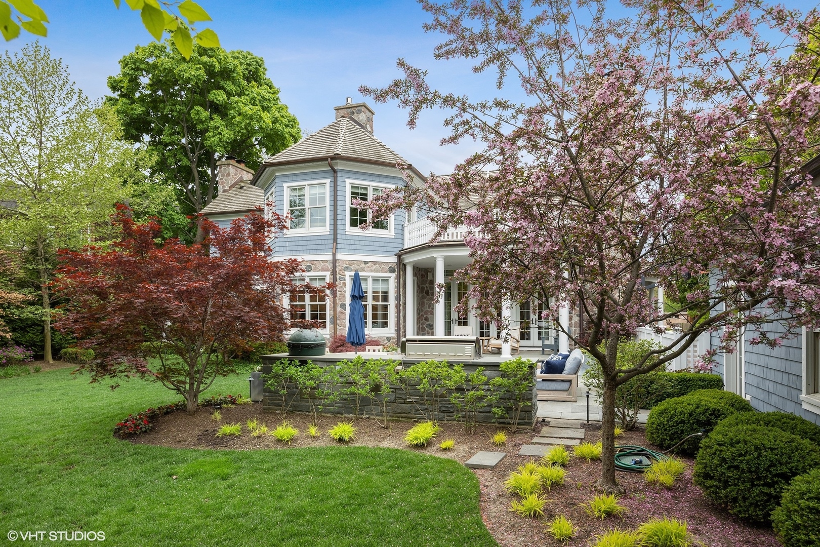 339 Linden Street Winnetka, IL 60093 - Photo 63 of 69 a front view of a house with a yard and trees