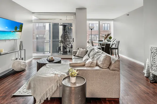 a living room with furniture and a table