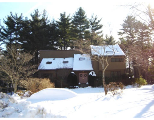52 Eliot Hill Road Natick, MA 01760 - Photo 1 of 28 a view of a house covered in snow