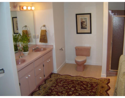 52 Eliot Hill Road Natick, MA 01760 - Photo 18 of 28 a bathroom with a toilet sink and mirror