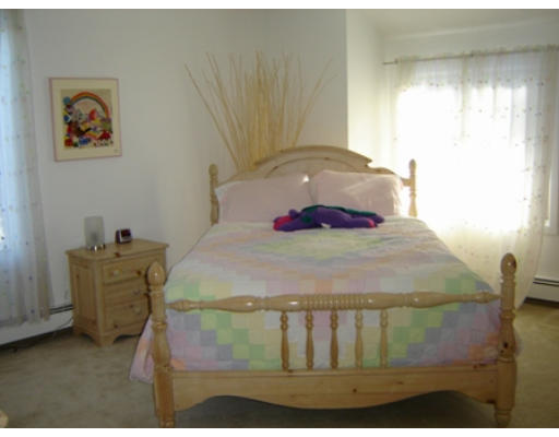 52 Eliot Hill Road Natick, MA 01760 - Photo 20 of 28 a bedroom with a bed and window