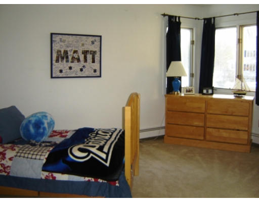 52 Eliot Hill Road Natick, MA 01760 - Photo 21 of 28 a bedroom with a bed and a window