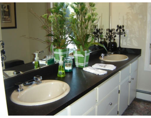 52 Eliot Hill Road Natick, MA 01760 - Photo 22 of 28 a bathroom with a sink and a mirror