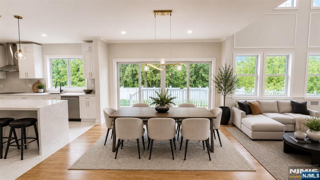 405 Valley Road River Edge, NJ 07661 - Photo 3 of 20 a view of a dining room with furniture window and outside view