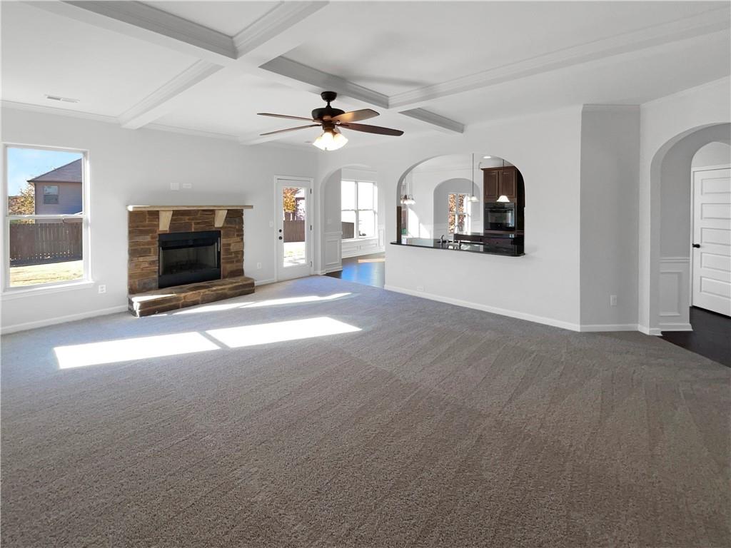 2879 Valaise Lane Lithonia, GA 30038 - Photo 4 of 25 a view of a livingroom with furniture fireplace and a ceiling fan