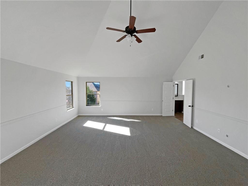 2879 Valaise Lane Lithonia, GA 30038 - Photo 9 of 25 a view of a livingroom with a ceiling fan and window