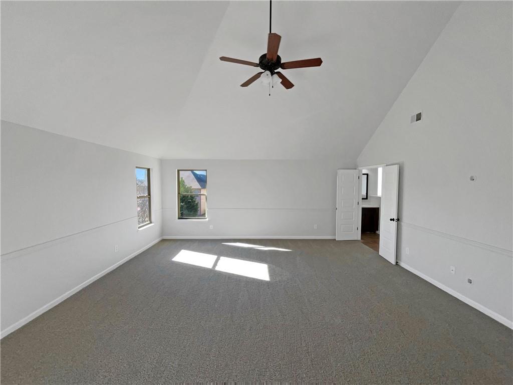 2879 Valaise Lane Lithonia, GA 30038 - Photo 10 of 25 a view of a livingroom with a ceiling fan and window