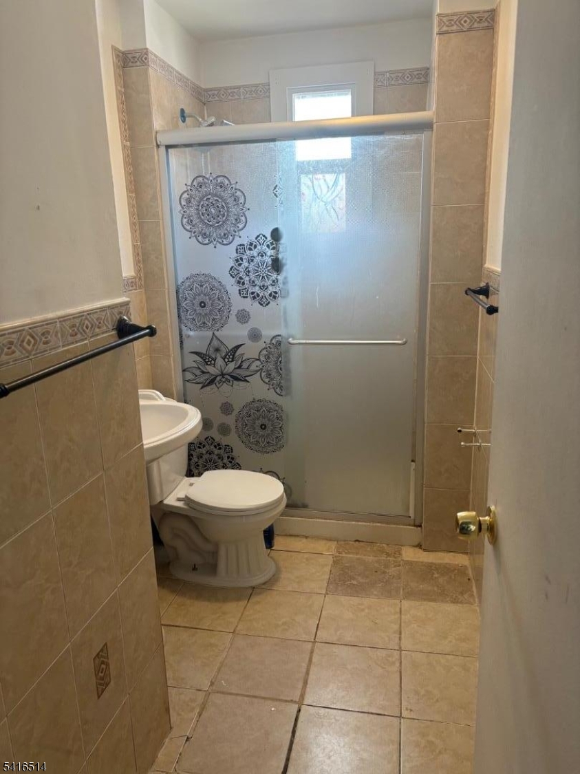 30 Cedar Street Hillside, NJ 07205 - Photo 4 of 10 a bathroom with a toilet and a shower