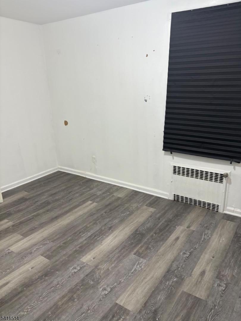 30 Cedar Street Hillside, NJ 07205 - Photo 7 of 10 a view of a hardwood area