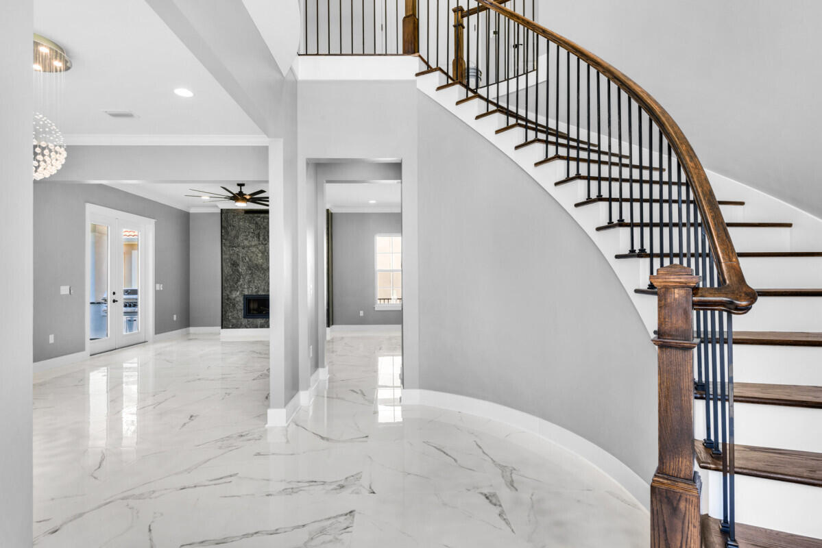 263 Calusa Boulevard Destin, FL 32541 - Photo 12 of 12 a view of entryway and hall with wooden floor