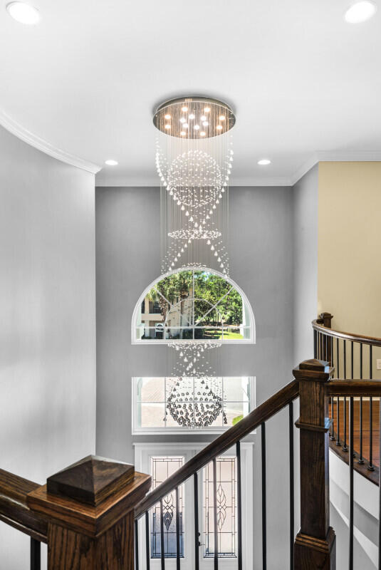 263 Calusa Boulevard Destin, FL 32541 - Photo 7 of 12 a view of a hallway to a livingroom with furniture