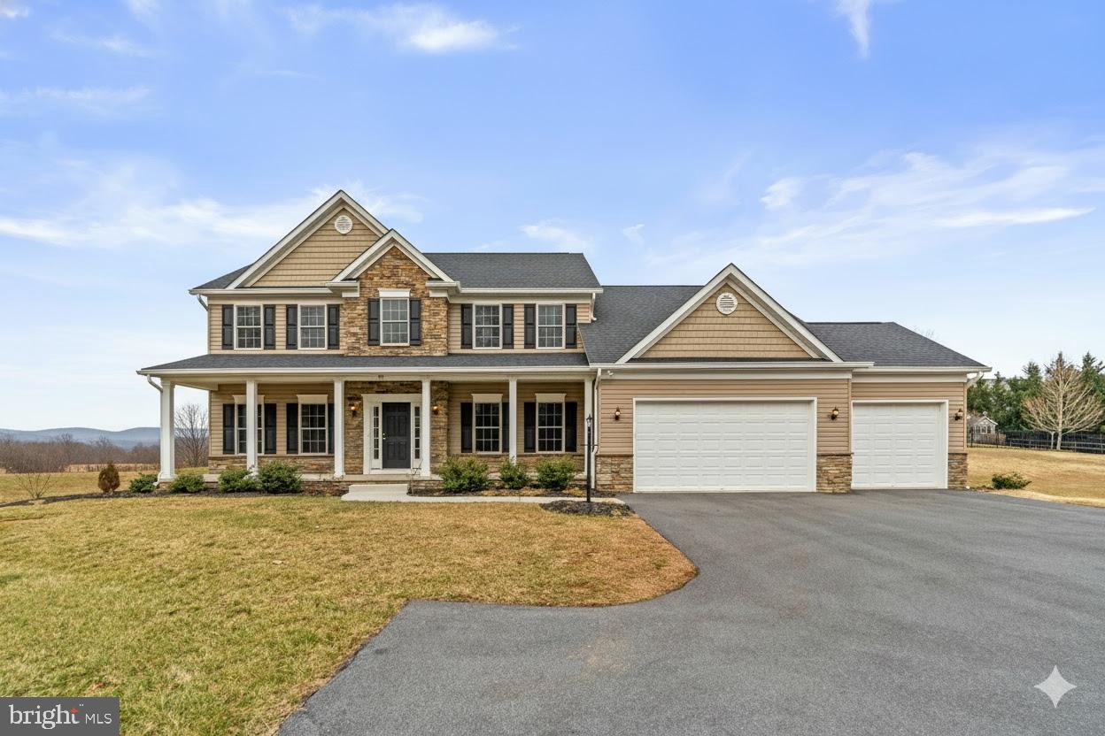 591 Johnsville Road Sykesville, MD 21784 - Photo 43 of 48 a front view of a house with a yard