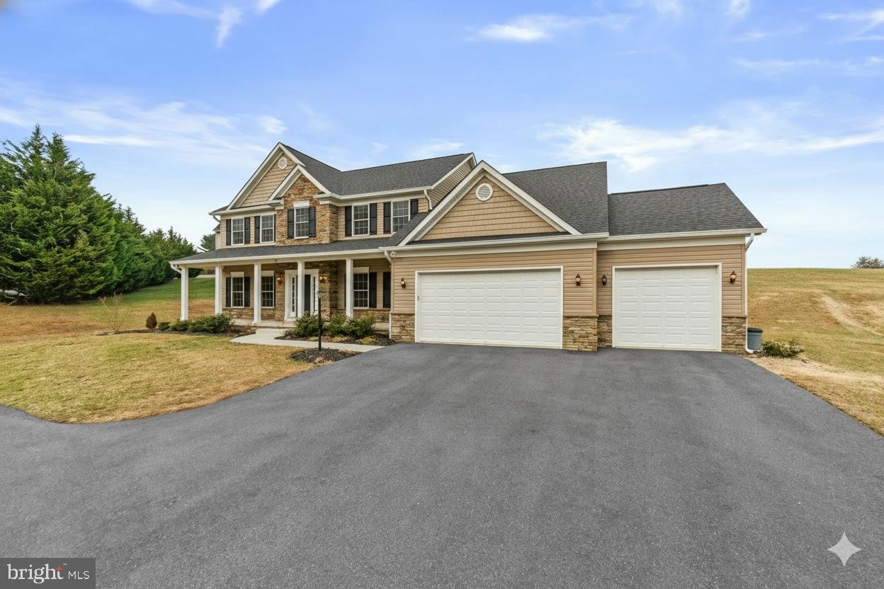 591 Johnsville Road Sykesville, MD 21784 - Photo 44 of 48 a front view of a house with a yard